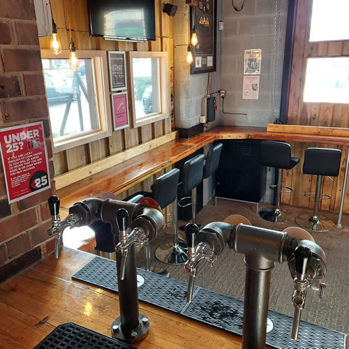 Craft beer bar with tables and chairs