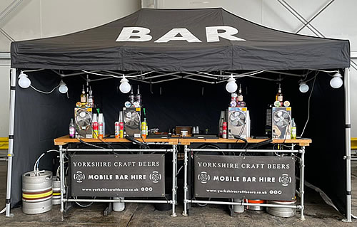 Mobile bar at Walkers Transport in Leeds serving beer to customers at a corporate event