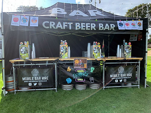 Mobile bar at large festival serving craft beer